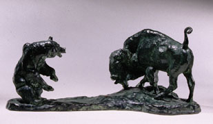 photo: The Bluffers bronze, a grizzly facing off with a bison bull