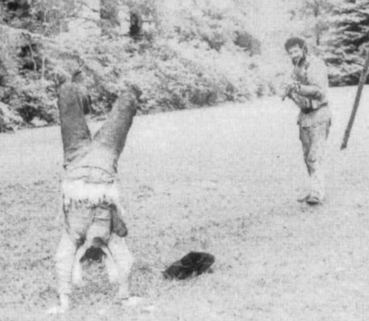 A man dances on his hands