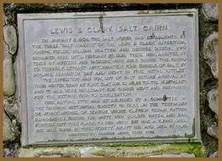 metal plaque on a stone cairn