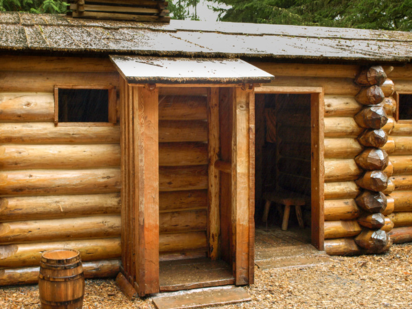 Small shelter made from slabs of wood