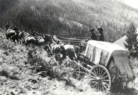 Historic photo of a stagecoach being pulled up Lemhi Pass by six horses