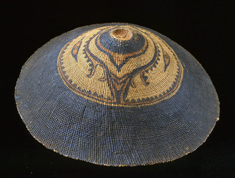 Cone shaped hat with the bottom half black and the top concave