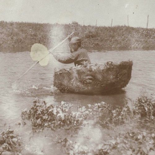 Indian man in a bull boat, c. 1900