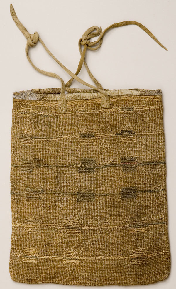Old woven bag with a faded pattern