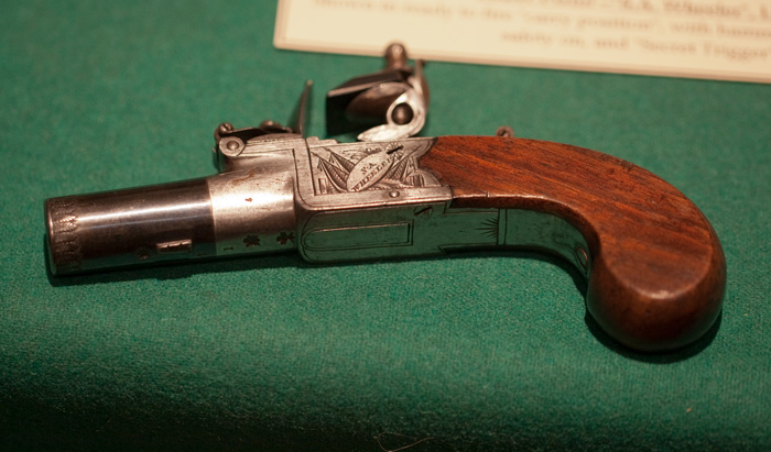 one of a pair of pocket pistols with no visible trigger