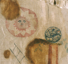 The masonic sun symbol drawn on an apron