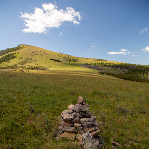 A rock cairn marks the Indian Road over Lewis and Clark Pass