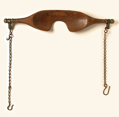 A wooden bar designed to be carried by a human