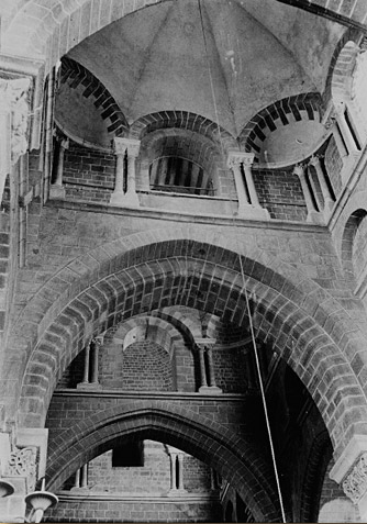 Pointed arches made from brick and stone resemble an umbrella