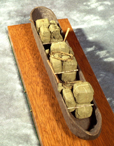 Dugout Canoe on a display stand