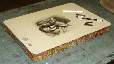 Lithograph stone: a large, thick slab with etchings