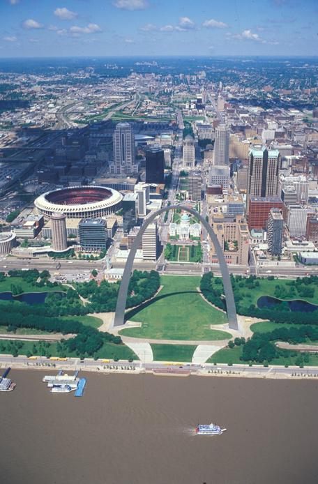 aerial photo of the Mississippi River, arch, and modern city of St. Louis