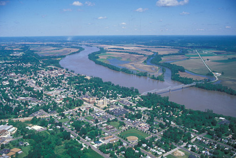 Aerial photo of a city on the muddy Missouri River