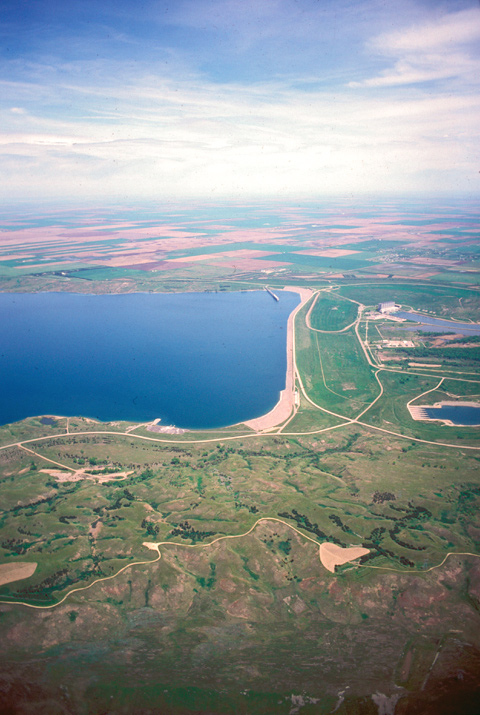 Aerial view of Oahe Dam, a large earthen structure