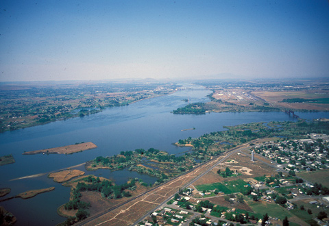 Two large, slackwater rivers converge in the desert