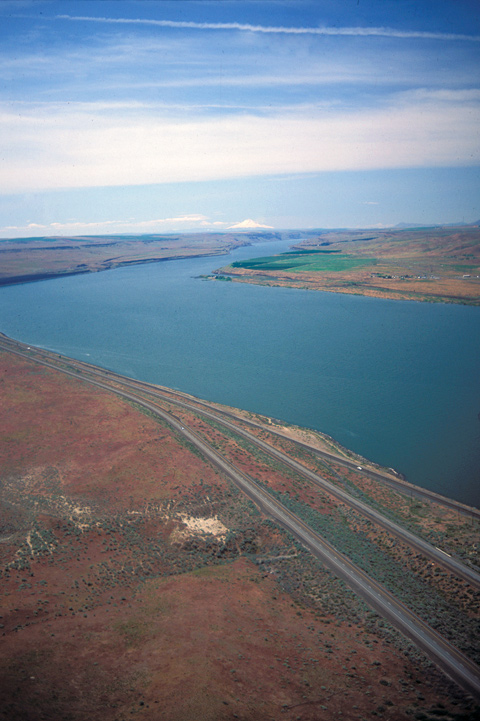 Wide, slackwater flowing slowly through the flat desert
