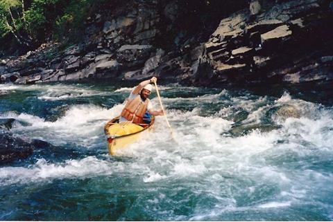 A modern canoeist in white water