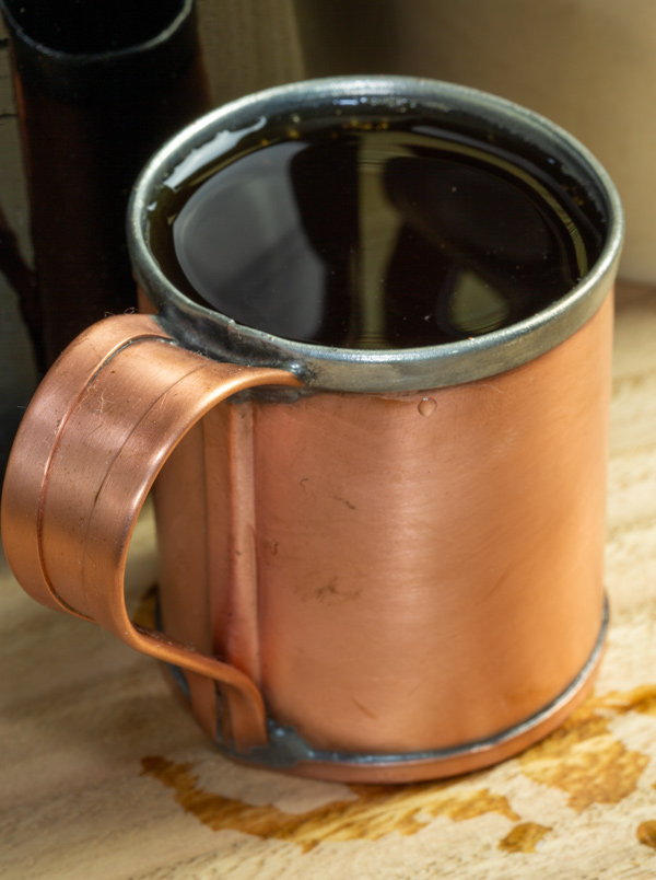 Gill—a small copper cup—of whiskey
