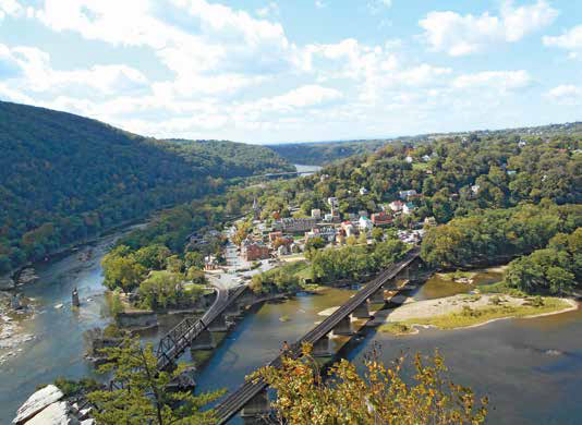 Two rivers converge in a deep valley