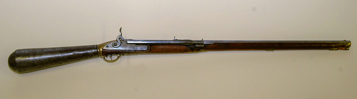 Musket with barrel shaped stock