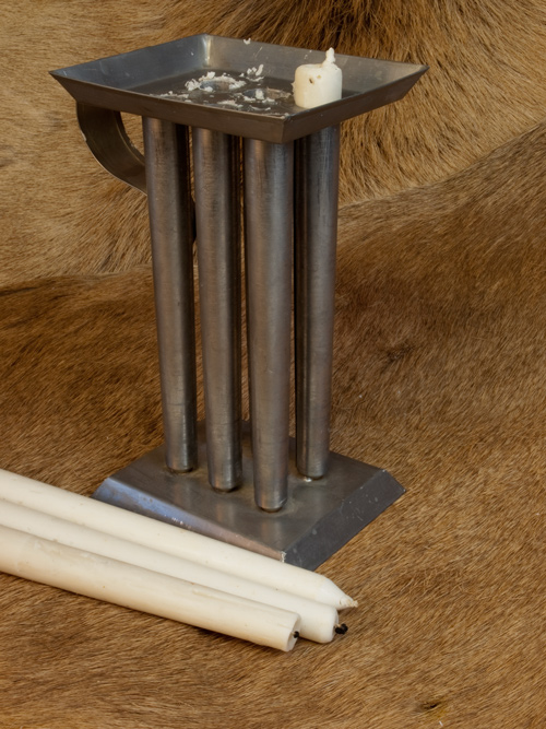 Tin mold for making candles with six tapered tubes about 1 foot long each