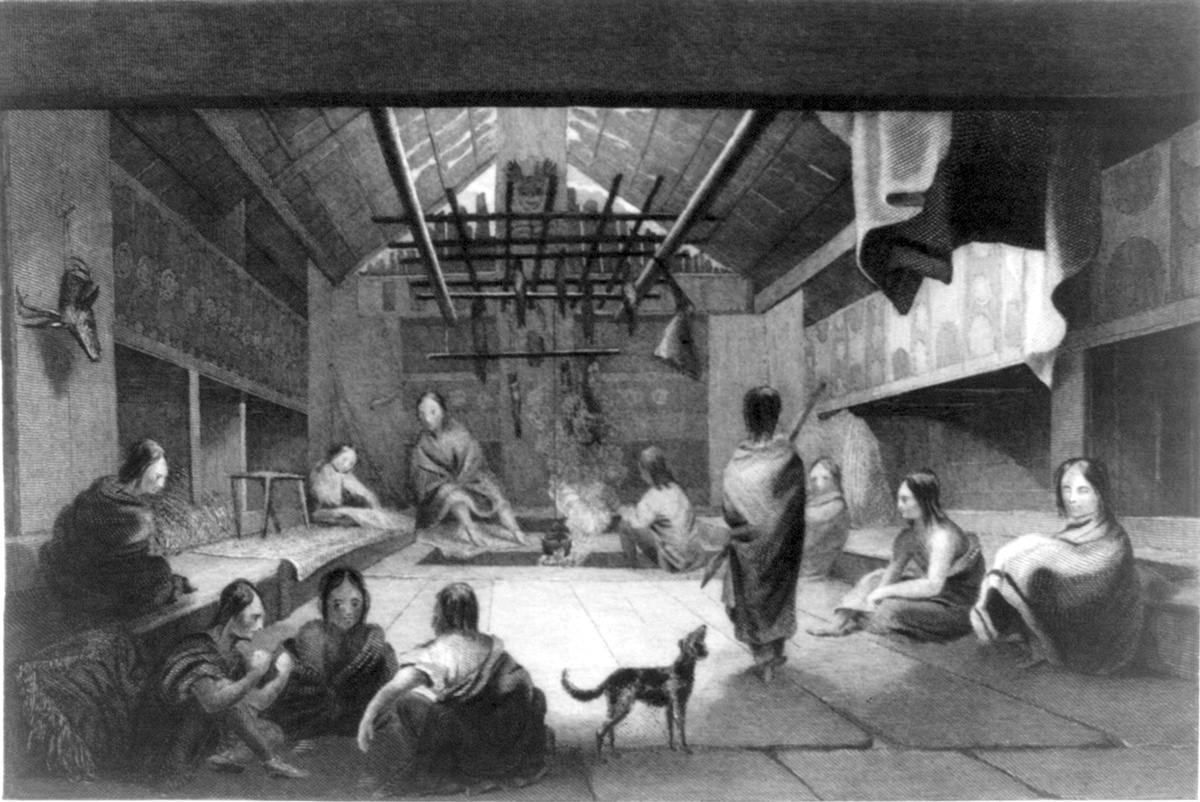 A Chinookan plankhouse interior with fire pit and bunks on the sides