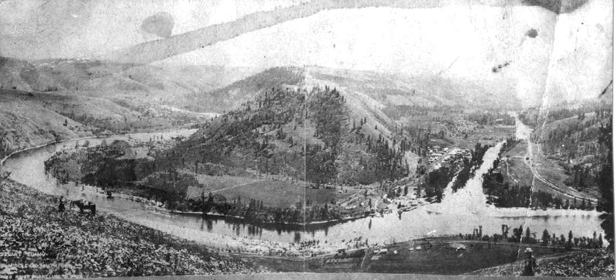 Two rivers meet between high hills