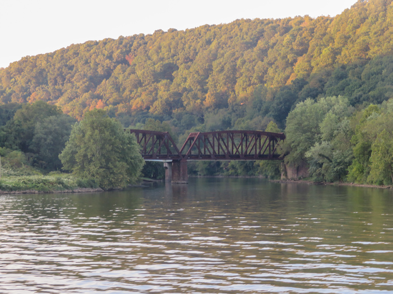 mouth of the Little Beaver River surrounded by low hills covered with trees