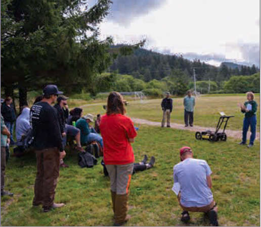 A small group assembles at Necus' Village Park
