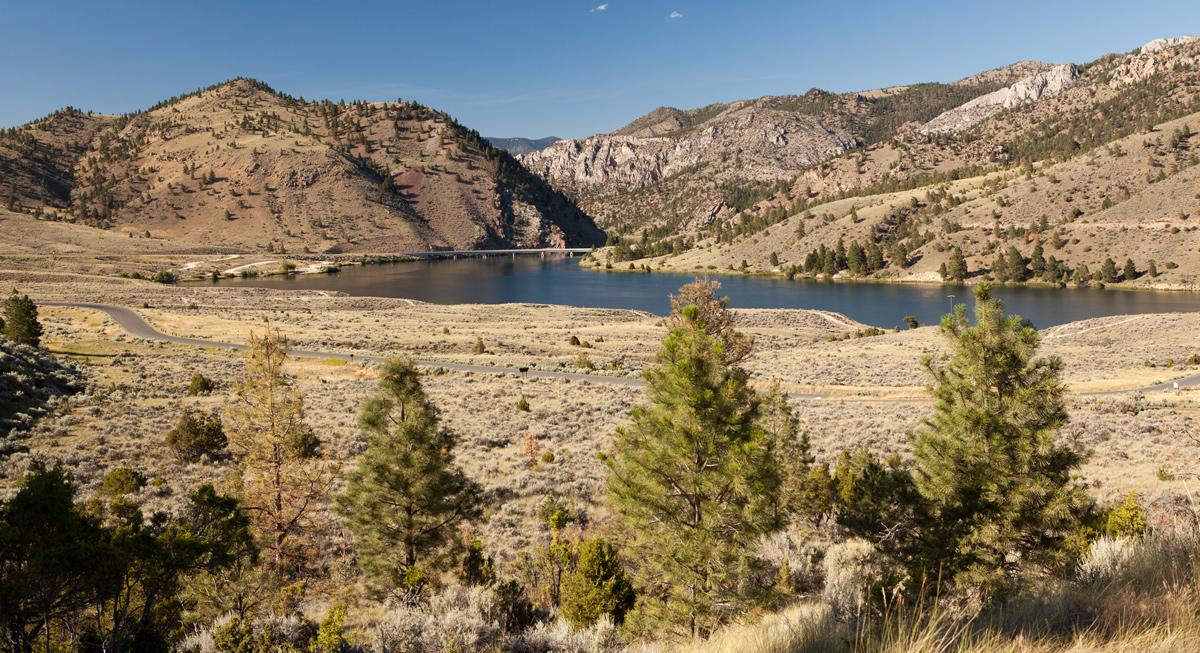 River entering high hills covered with sagebrush and small pines