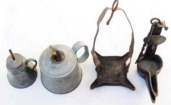 Four early oil lamps