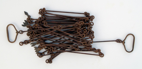 Chain made of skinny, long links used to measure distance